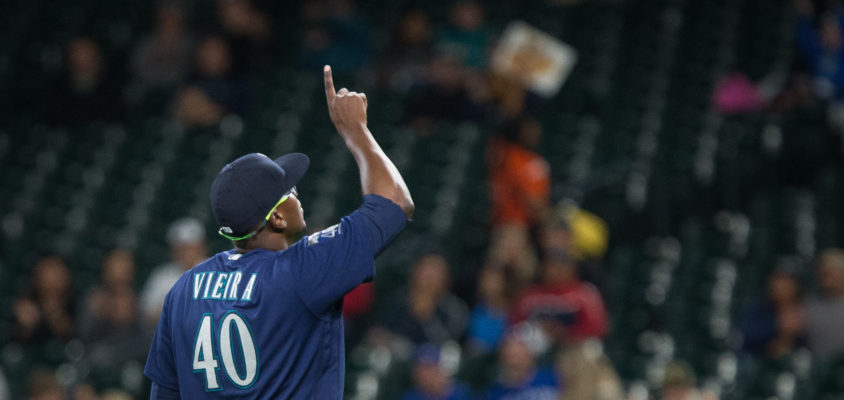 SEATTLE, WA - AUGUST 14: Thyago Vieira #40 walks off the field after going 1-2-3 in the top of the ninth inning during his major league debut against the Baltimore Orioles of the Seattle Mariners at Safeco Field on August 14, 2017 in Seattle, Washington.