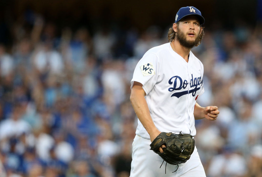 Clayton Kershaw of the Los Angeles Dodgers reacts during the third inning against the Houston Astros in game one of the 2017 World Series at Dodger Stadium on October 24, 2017 in Los Angeles, California.