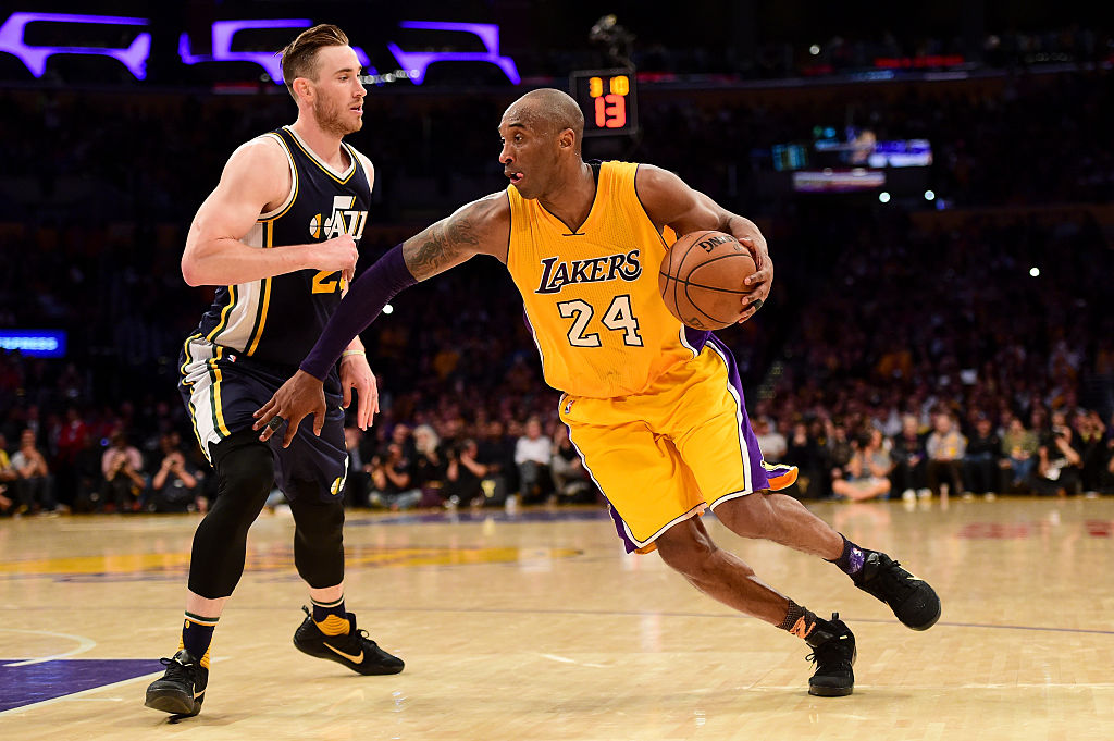 LOS ANGELES, CA - APRIL 13: Kobe Bryant #24 of the Los Angeles Lakers drives on Gordon Hayward #20 of the Utah Jazz in the fourth quarter at Staples Center on April 13, 2016 in Los Angeles, California