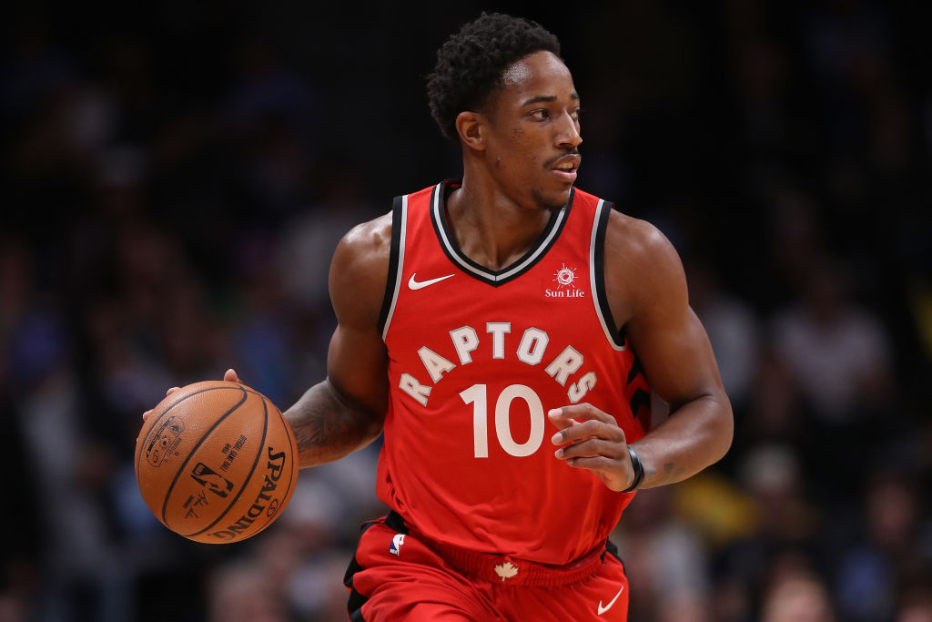 DENVER, CO - NOVEMBER 01: Demar Derozan #10 of the Toronto Raptors brings the ball down the court against the Denver Nuggets at the Pepsi Center on November 1, 2017 in Denver, Colorado