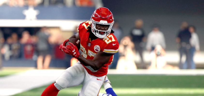 ARLINGTON, TX - NOVEMBER 05: Kareem Hunt #27 of the Kansas City Chiefs gains first down yardage against Sean Lee #50 of the Dallas Cowboys in the second quarter of a football game at AT&T Stadium on November 5, 2017 in Arlington, Texas.