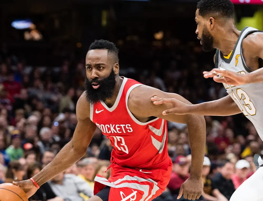 CLEVELAND, OH - FEBRUARY 3: James Harden #13 of the Houston Rockets drives around Tristan Thompson #13 of the Cleveland Cavaliers during the first half at Quicken Loans Arena on February 3, 2018 in Cleveland, Ohio