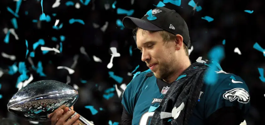 Nick Foles #9 of the Philadelphia Eagles celebrates with the Lombardi Trophy after defeating the New England Patriots 41-33 in Super Bowl LII at U.S. Bank Stadium on February 4, 2018 in Minneapolis, Minnesota.