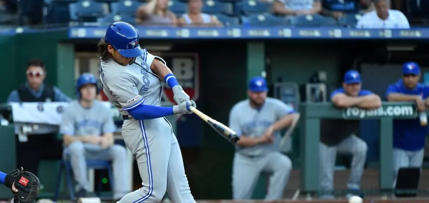 KANSAS CITY, MISSOURI - JULY 29: Bo Bichette #11 of the Toronto Blue Jays get his first Major League hit in the first inning against the Kansas City Royals at Kauffman Stadium on July 29, 2019 in Kansas City, Missouri