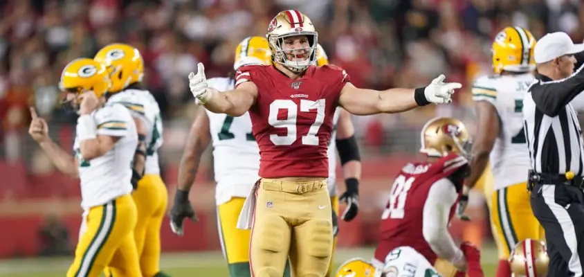 SANTA CLARA, CALIFORNIA - NOVEMBER 24: Nick Bosa #97 of the San Francisco 49ers celebrates after the sacked the quarterback against the Green Bay Packers during the second half of an NFL football game at Levi's Stadium on November 24, 2019 in Santa Clara, California. The 49ers won the game 37-8