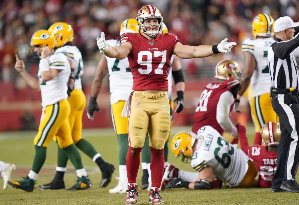 SANTA CLARA, CALIFORNIA - NOVEMBER 24: Nick Bosa #97 of the San Francisco 49ers celebrates after the sacked the quarterback against the Green Bay Packers during the second half of an NFL football game at Levi's Stadium on November 24, 2019 in Santa Clara, California. The 49ers won the game 37-8