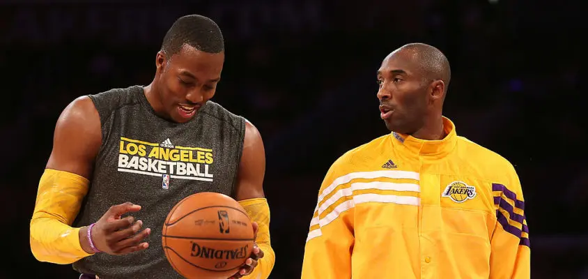 LOS ANGELES, CA - OCTOBER 21: Dwight Howard #12 (L) and Kobe Bryant #24 of the Los Angeles Lakers talks as they warm up to play the Sacramento Kings at Staples Center on October 21, 2012 in Los Angeles, California