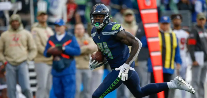 SEATTLE, WA - NOVEMBER 03: Wide receiver DK Metcalf #14 of the Seattle Seahawks rushes for a touchdown in the second half against the Tampa Bay Buccaneers at CenturyLink Field on November 3, 2019 in Seattle, Washington. The Seahawks beat the Buccaneers 40-34 in overtime