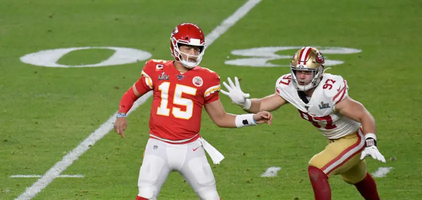 MIAMI, FLORIDA - FEBRUARY 02: Nick Bosa #97 of the San Francisco 49ers puts pressure on Patrick Mahomes #15 of the Kansas City Chiefs in Super Bowl LIV at Hard Rock Stadium on February 02, 2020 in Miami, Florida. The Chiefs won the game 31-20