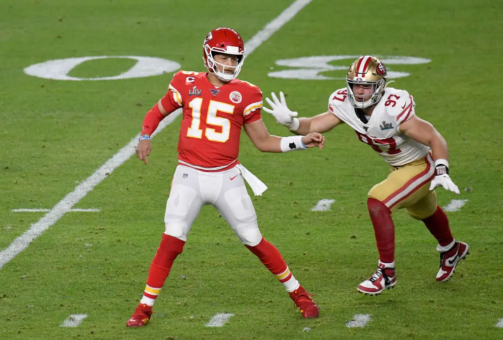 MIAMI, FLORIDA - FEBRUARY 02: Nick Bosa #97 of the San Francisco 49ers puts pressure on Patrick Mahomes #15 of the Kansas City Chiefs in Super Bowl LIV at Hard Rock Stadium on February 02, 2020 in Miami, Florida. The Chiefs won the game 31-20