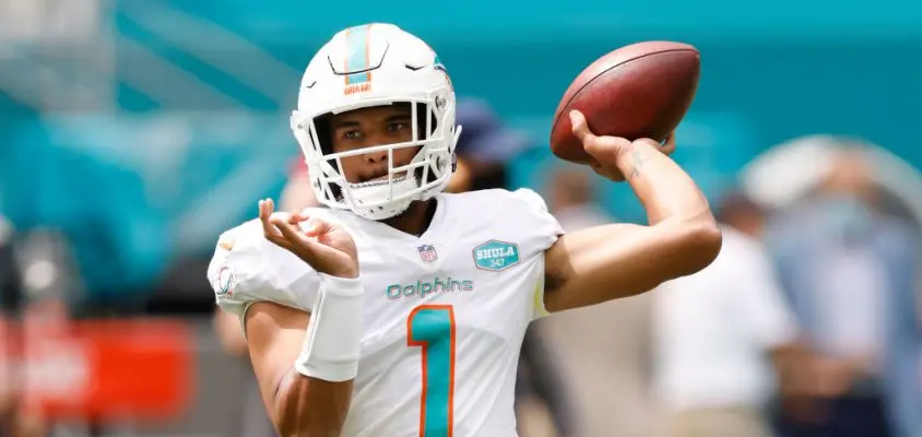 MIAMI GARDENS, FLORIDA - OCTOBER 04: Tua Tagovailoa #1 of the Miami Dolphins warms up prior to the game against the Seattle Seahawks at Hard Rock Stadium on October 04, 2020 in Miami Gardens, Florida