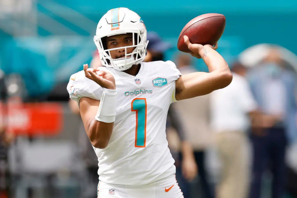 MIAMI GARDENS, FLORIDA - OCTOBER 04: Tua Tagovailoa #1 of the Miami Dolphins warms up prior to the game against the Seattle Seahawks at Hard Rock Stadium on October 04, 2020 in Miami Gardens, Florida