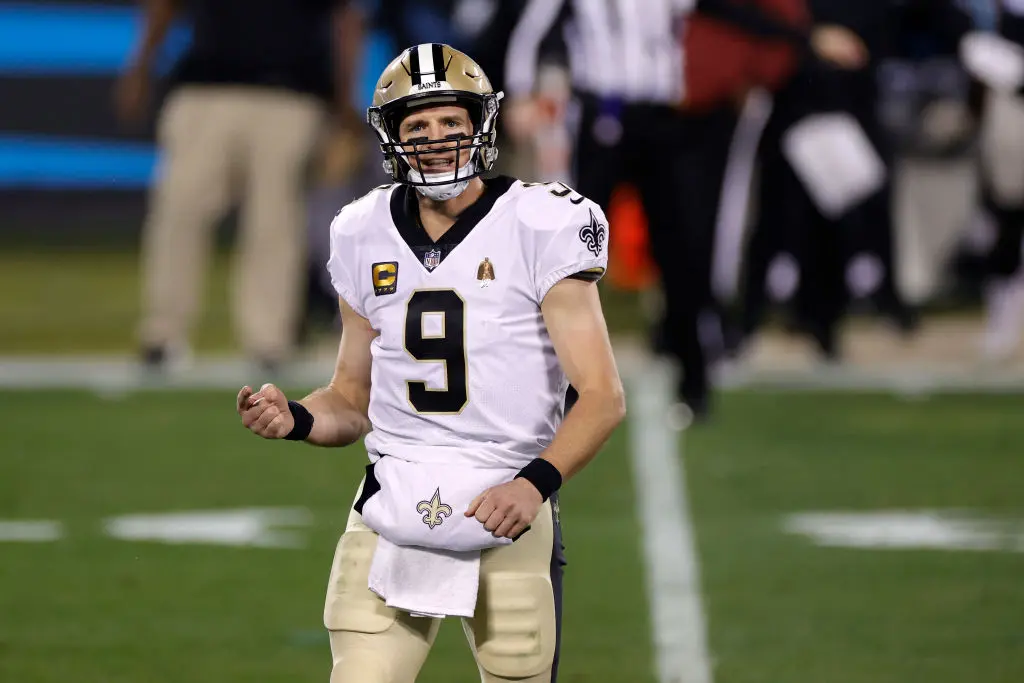 CHARLOTTE, NORTH CAROLINA - JANUARY 03: Quarterback Drew Brees #9 of the New Orleans Saints reacts following a play during the third quarter of their game against the Carolina Panthers at Bank of America Stadium on (Photo by