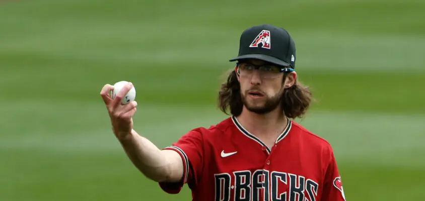 SCOTTSDALE, ARIZONA - FEBRUARY 28: Starting pitcher Zac Gallen #23 of the Arizona Diamondbacks warms up prior to the Cactus League spring training baseball game against the Colorado Rockies on February 28, 2021 in Scottsdale, Arizona