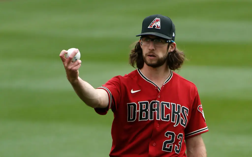 SCOTTSDALE, ARIZONA - FEBRUARY 28: Starting pitcher Zac Gallen #23 of the Arizona Diamondbacks warms up prior to the Cactus League spring training baseball game against the Colorado Rockies on February 28, 2021 in Scottsdale, Arizona