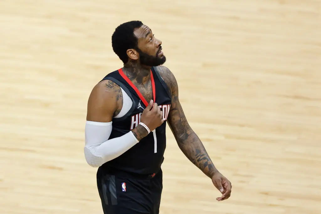 MIAMI, FLORIDA - APRIL 19: John Wall #1 of the Houston Rockets reacts against the Miami Heat during the first quarter at American Airlines Arena on April 19, 2021 in Miami, Florida