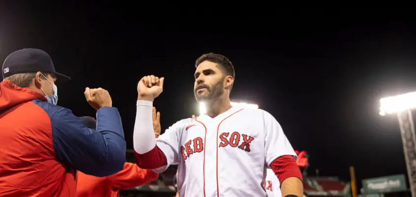 BOSTON, MA - APRIL 6: J.D. Martinez #28 of the Boston Red Sox reacts after hitting a game winning walk-off single during the twelfth inning against the Tampa Bay Rays on April 6, 2021 at Fenway Park in Boston, Massachusetts