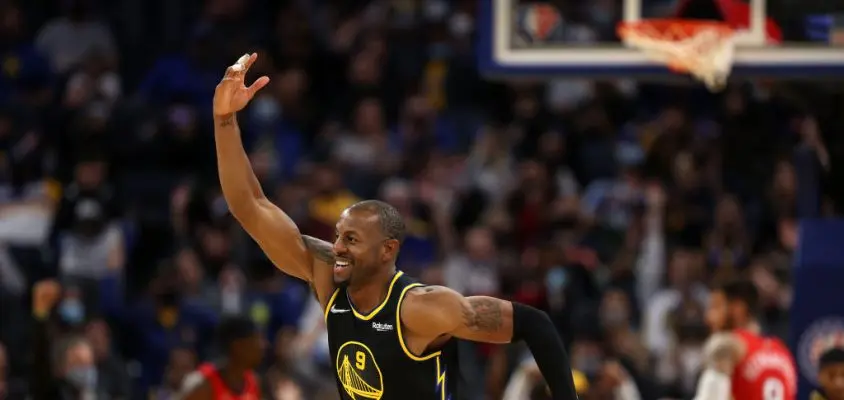 SAN FRANCISCO, CALIFORNIA - NOVEMBER 05: Andre Iguodala #9 of the Golden State Warriors reacts after Gary Payton II #0 of the Golden State Warriors made a basket against the New Orleans Pelicans at Chase Center on November 05, 2021 in San Francisco, California