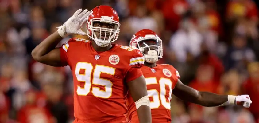 KANSAS CITY, MISSOURI - NOVEMBER 21: Chris Jones #95 and Willie Gay #50 of the Kansas City Chiefs rile up the fans in the fourth quarter against the Dallas Cowboys at Arrowhead Stadium on November 21, 2021 in Kansas City, Missouri