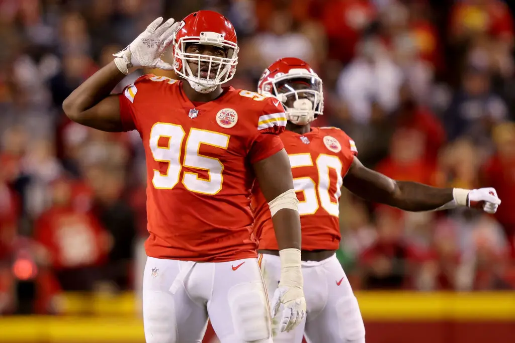 KANSAS CITY, MISSOURI - NOVEMBER 21: Chris Jones #95 and Willie Gay #50 of the Kansas City Chiefs rile up the fans in the fourth quarter against the Dallas Cowboys at Arrowhead Stadium on November 21, 2021 in Kansas City, Missouri