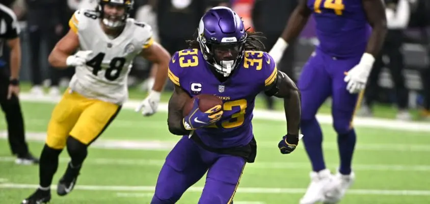 MINNEAPOLIS, MINNESOTA - DECEMBER 09: Dalvin Cook #33 of the Minnesota Vikings carries the ball in the second quarter of the game against the Pittsburgh Steelers at U.S. Bank Stadium on December 09, 2021 in Minneapolis, Minnesota