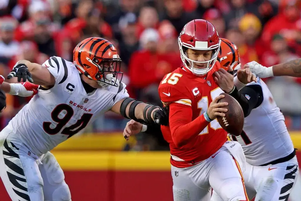 KANSAS CITY, MISSOURI - JANUARY 30: Defensive end Sam Hubbard #94 of the Cincinnati Bengals sacks quarterback Patrick Mahomes #15 of the Kansas City Chiefs during the second half of the AFC Championship Game at Arrowhead Stadium on January 30, 2022 in Kansas City, Missouri