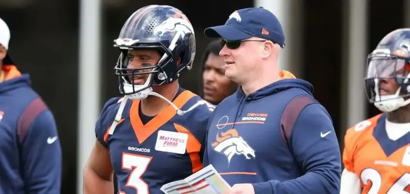 Broncos quarterback Russell Wilson and head coach Nathaniel Hackette