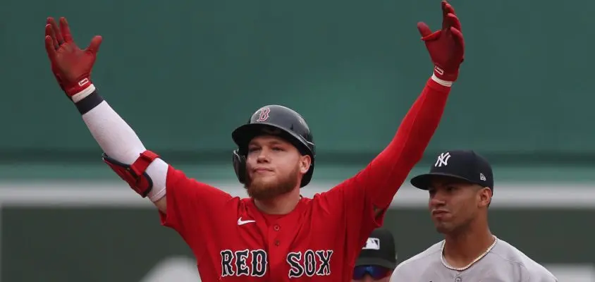 BOSTON MA. - JULY 25: Boston Red Sox left fielder Alex Verdugo reacts after hitting a double, spoiling a no-hitter by New York Yankees starting pitcher Domingo German, during the 8th inning of the game at Fenway Park on July 25, 2021 in Boston, MA