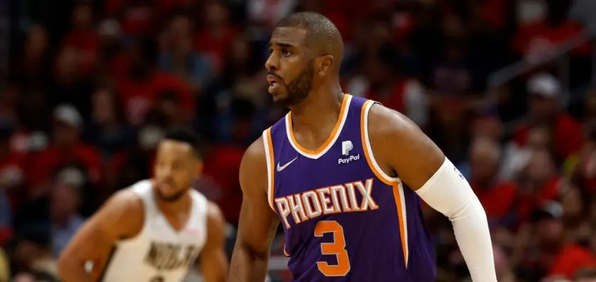 NEW ORLEANS, LOUISIANA - APRIL 28: Chris Paul #3 of the Phoenix Suns drives the ball against the New Orleans Pelicans at Smoothie King Center on April 28, 2022 in New Orleans, Louisiana.