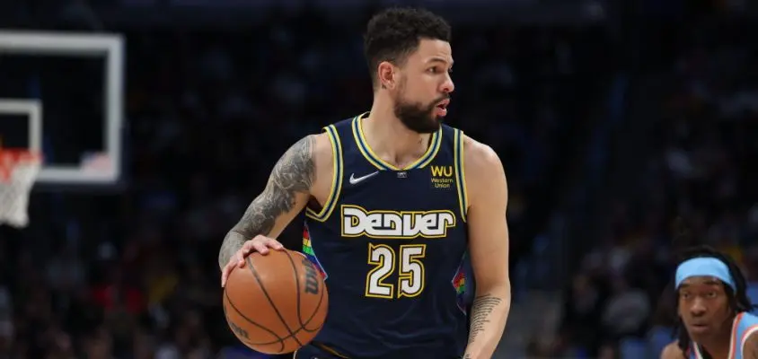 DENVER, CO - MARCH 22: Austin Rivers #25 of the Denver Nuggets dribbles against the LA Clippers at Ball Arena on March 22, 2022 in Denver, Colorado