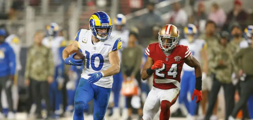 SANTA CLARA, CALIFORNIA - NOVEMBER 15: Cooper Kupp #10 of the Los Angeles Rams runs away from K'Waun Williams #24 of the San Francisco 49ers after a catch in the fourth quarter at Levi's Stadium on November 15, 2021 in Santa Clara, California