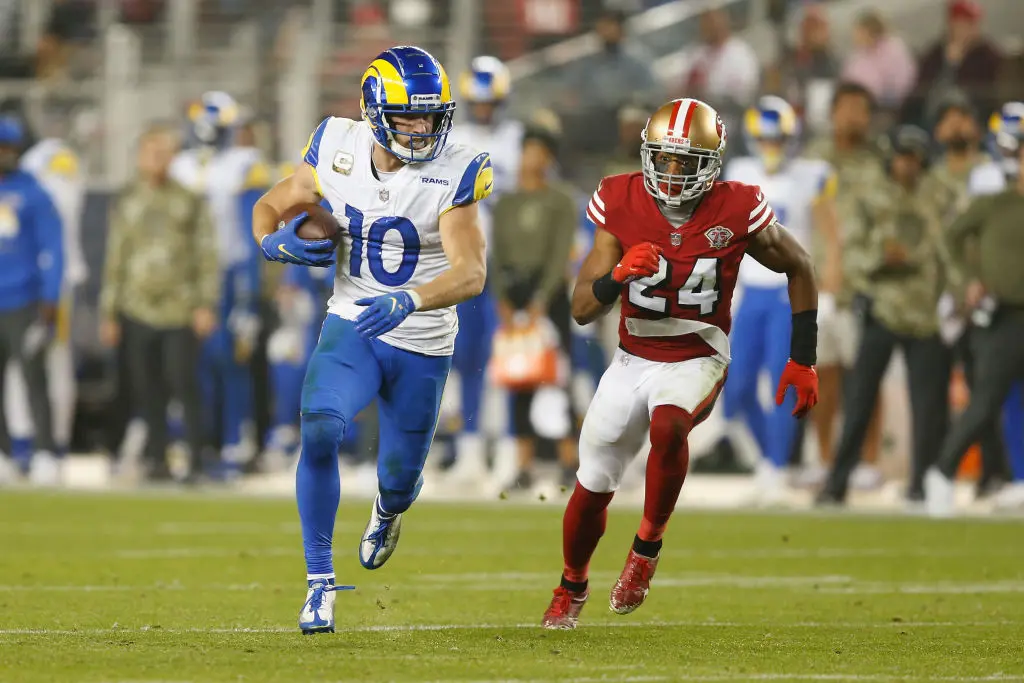 SANTA CLARA, CALIFORNIA - NOVEMBER 15: Cooper Kupp #10 of the Los Angeles Rams runs away from K'Waun Williams #24 of the San Francisco 49ers after a catch in the fourth quarter at Levi's Stadium on November 15, 2021 in Santa Clara, California