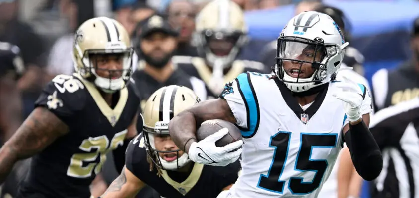 CHARLOTTE, NORTH CAROLINA - SEPTEMBER 25: Laviska Shenault Jr. #15 of the Carolina Panthers runs for a touchdown against the New Orleans Saints during the fourth quarter at Bank of America Stadium on September 25, 2022 in Charlotte, North Carolina.