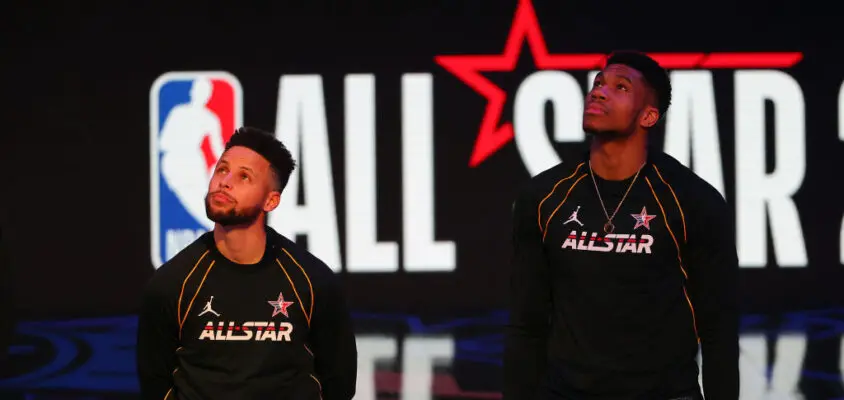 ATLANTA, GEORGIA - MARCH 07: Stephen Curry #30 and Giannis Antetokounmpo #34 of Team LeBron look on prior to the 70th NBA All-Star Game at State Farm Arena on March 07, 2021 in Atlanta, Georgia.