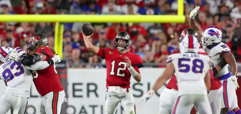 TAMPA, FL - DECEMBER 12: Tampa Bay Buccaneers Quarterback Tom Brady (12) throws a pass during the regular season game between the Buffalo Bills and the Tampa Bay Buccaneers on December 12, 2021 at Raymond James Stadium in Tampa, Florida