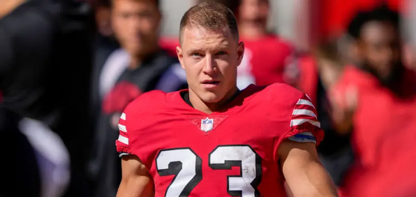 SANTA CLARA, CALIFORNIA - OCTOBER 23: Christian McCaffrey #23 of the San Francisco 49ers stands on the sidelines against the Kansas City Chiefs during the first quarter at Levi's Stadium on October 23, 2022 in Santa Clara, California.