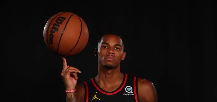 ATLANTA, GEORGIA - SEPTEMBER 23: Dejounte Murray #5 of the Atlanta Hawks poses for portraits during media day at PC&E Atlanta on September 23, 2022 in Atlanta, Georgia.