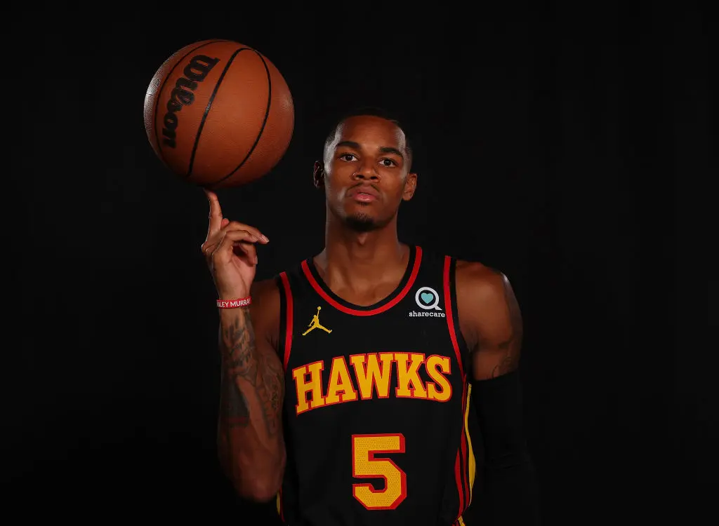 ATLANTA, GEORGIA - SEPTEMBER 23: Dejounte Murray #5 of the Atlanta Hawks poses for portraits during media day at PC&E Atlanta on September 23, 2022 in Atlanta, Georgia.