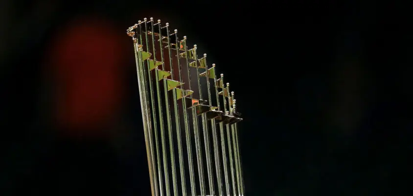 HOUSTON, TX - OCTOBER 30: Members of the Washington Nationals celebrate with the Commissioner's Trophy after the Nationals defeated the Houston Astros in Game 7 to win the 2019 World Series at Minute Maid Park on Wednesday, October 30, 2019 in Houston, Texas