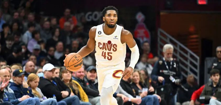 CLEVELAND, OHIO - NOVEMBER 23: Donovan Mitchell #45 of the Cleveland Cavaliers brings the ball up court during the third quarter against the Portland Trail Blazers at Rocket Mortgage Fieldhouse on November 23, 2022 in Cleveland, Ohio. The Cavaliers defeated the Trail Blazers 114-96