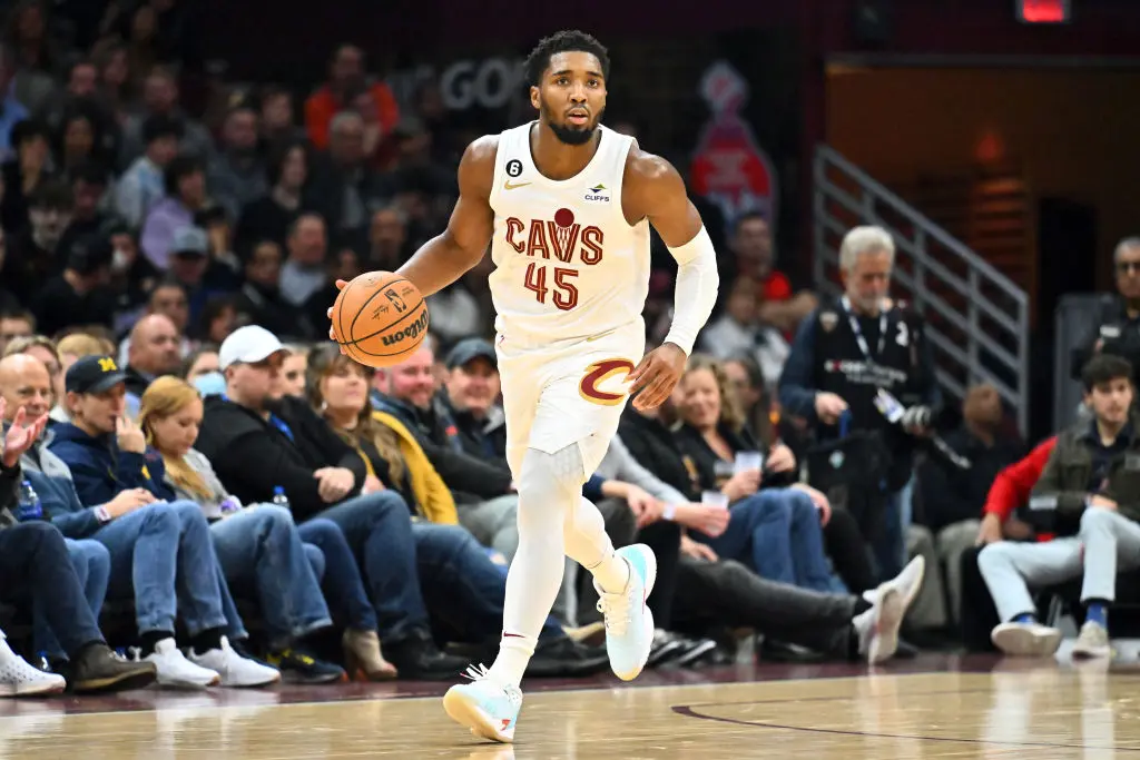 CLEVELAND, OHIO - NOVEMBER 23: Donovan Mitchell #45 of the Cleveland Cavaliers brings the ball up court during the third quarter against the Portland Trail Blazers at Rocket Mortgage Fieldhouse on November 23, 2022 in Cleveland, Ohio. The Cavaliers defeated the Trail Blazers 114-96