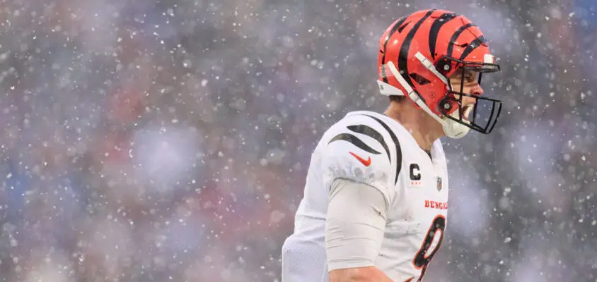 ORCHARD PARK, NY - JANUARY 22: Joe Burrow #9 of the Cincinnati Bengals celebrates after a play against the Buffalo Bills during the first half at Highmark Stadium on January 22, 2023 in Orchard Park, New York.