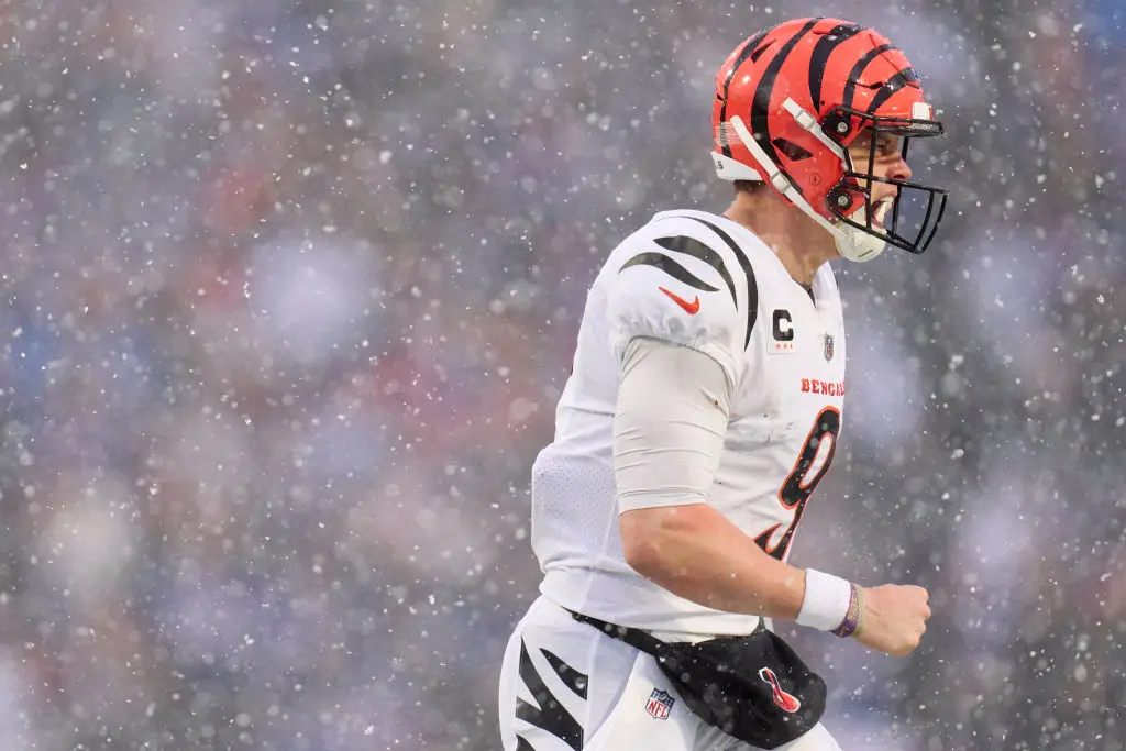 ORCHARD PARK, NY - JANUARY 22: Joe Burrow #9 of the Cincinnati Bengals celebrates after a play against the Buffalo Bills during the first half at Highmark Stadium on January 22, 2023 in Orchard Park, New York.