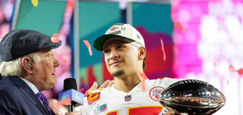 GLENDALE, AZ - FEBRUARY 12: Patrick Mahomes #15 of the Kansas City Chiefs hoists the Lombardi Trophy after Super Bowl LVII against the Philadelphia Eagles at State Farm Stadium on February 12, 2023 in Glendale, Arizona. The Chiefs defeated the Eagles 38-35.