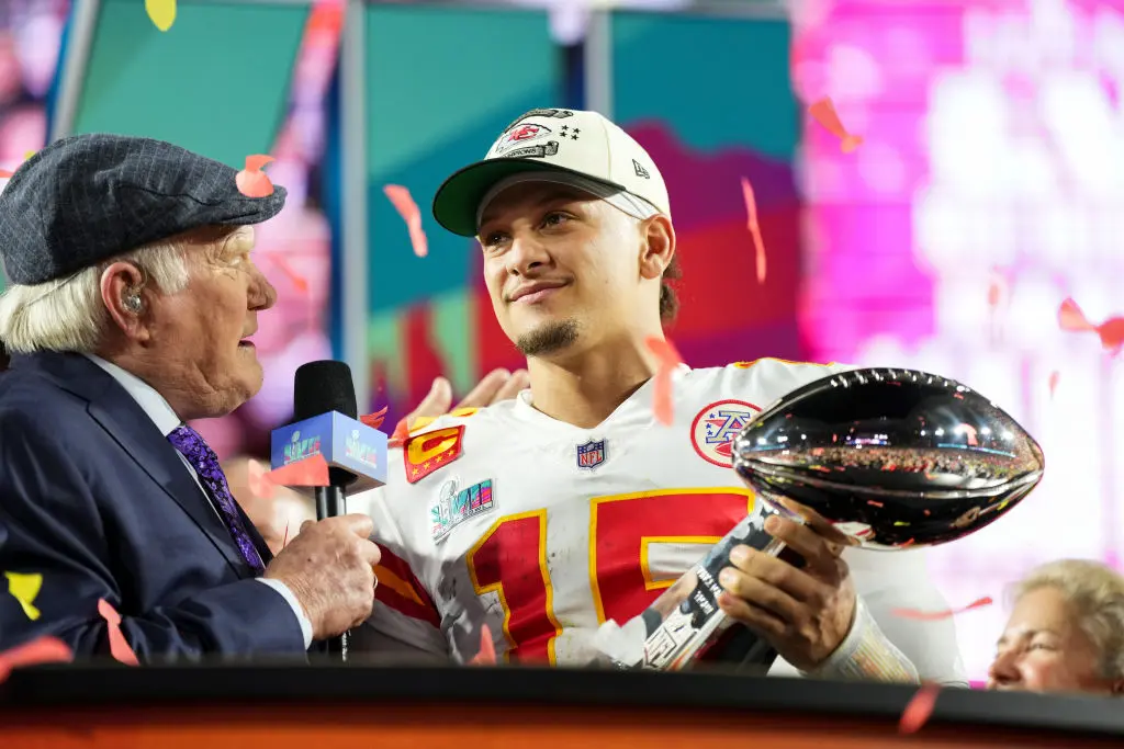 GLENDALE, AZ - FEBRUARY 12: Patrick Mahomes #15 of the Kansas City Chiefs hoists the Lombardi Trophy after Super Bowl LVII against the Philadelphia Eagles at State Farm Stadium on February 12, 2023 in Glendale, Arizona. The Chiefs defeated the Eagles 38-35.