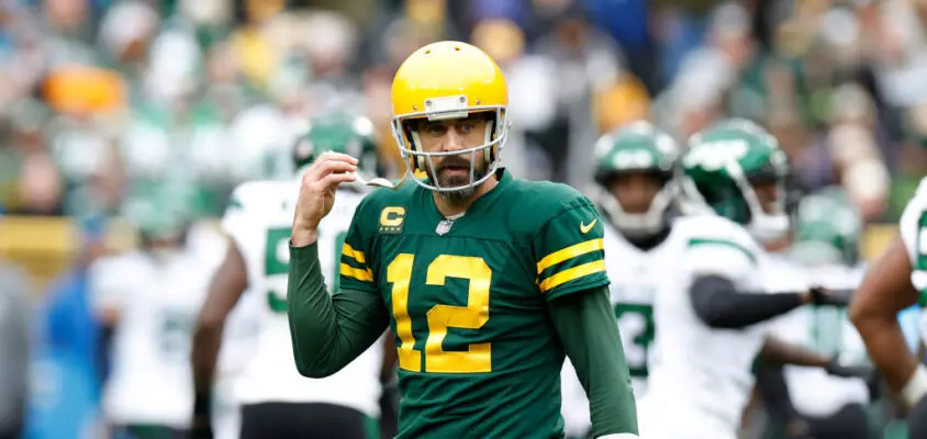 GREEN BAY, WISCONSIN - OCTOBER 16: Aaron Rodgers #12 of the Green Bay Packers reacts to a fumble in the third quarter of a game against the New York Jets at Lambeau Field on October 16, 2022 in Green Bay, Wisconsin.