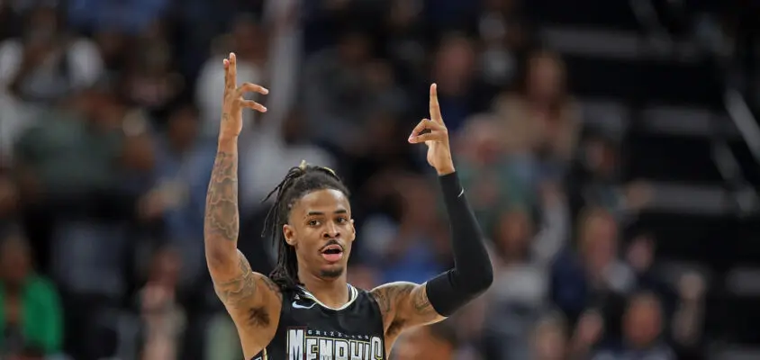 MEMPHIS, TENNESSEE - FEBRUARY 28: Ja Morant #12 of the Memphis Grizzlies reacts during the game against the Los Angeles Lakers at FedExForum on February 28, 2023 in Memphis, Tennessee.