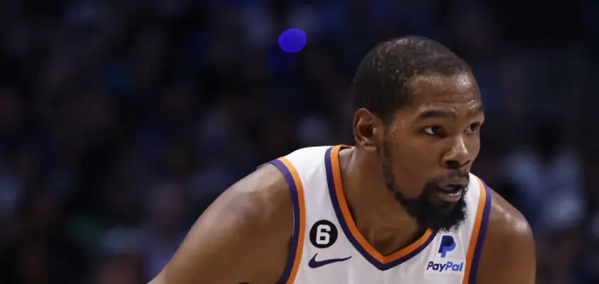 DALLAS, TX - MARCH 5: Kevin Durant #35 of the Phoenix Suns handles the ball against the Dallas Mavericks in the second half at American Airlines Center on March 5, 2023 in Dallas, Texas. The Suns won 130-126.