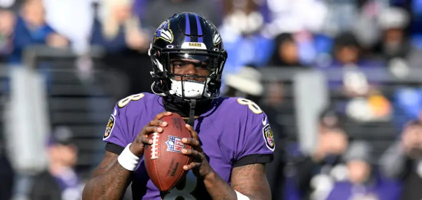 BALTIMORE, MARYLAND - DECEMBER 04: Lamar Jackson #8 of the Baltimore Ravens warms up before the game against the Denver Broncos at M&T Bank Stadium on December 04, 2022 in Baltimore, Maryland.