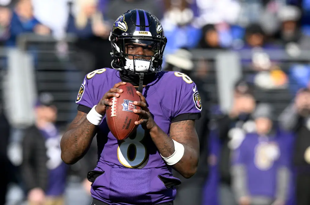 BALTIMORE, MARYLAND - DECEMBER 04: Lamar Jackson #8 of the Baltimore Ravens warms up before the game against the Denver Broncos at M&T Bank Stadium on December 04, 2022 in Baltimore, Maryland.